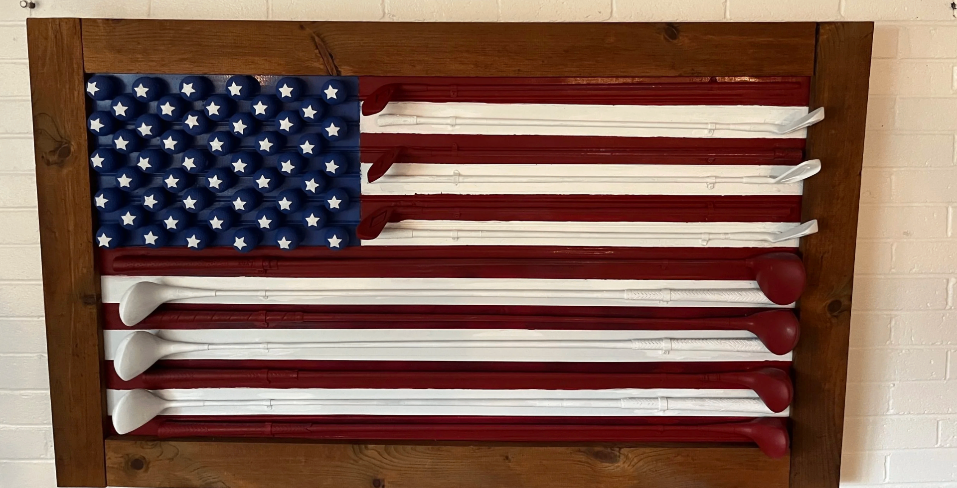 The finished American flag built from real golf clubs and golf balls