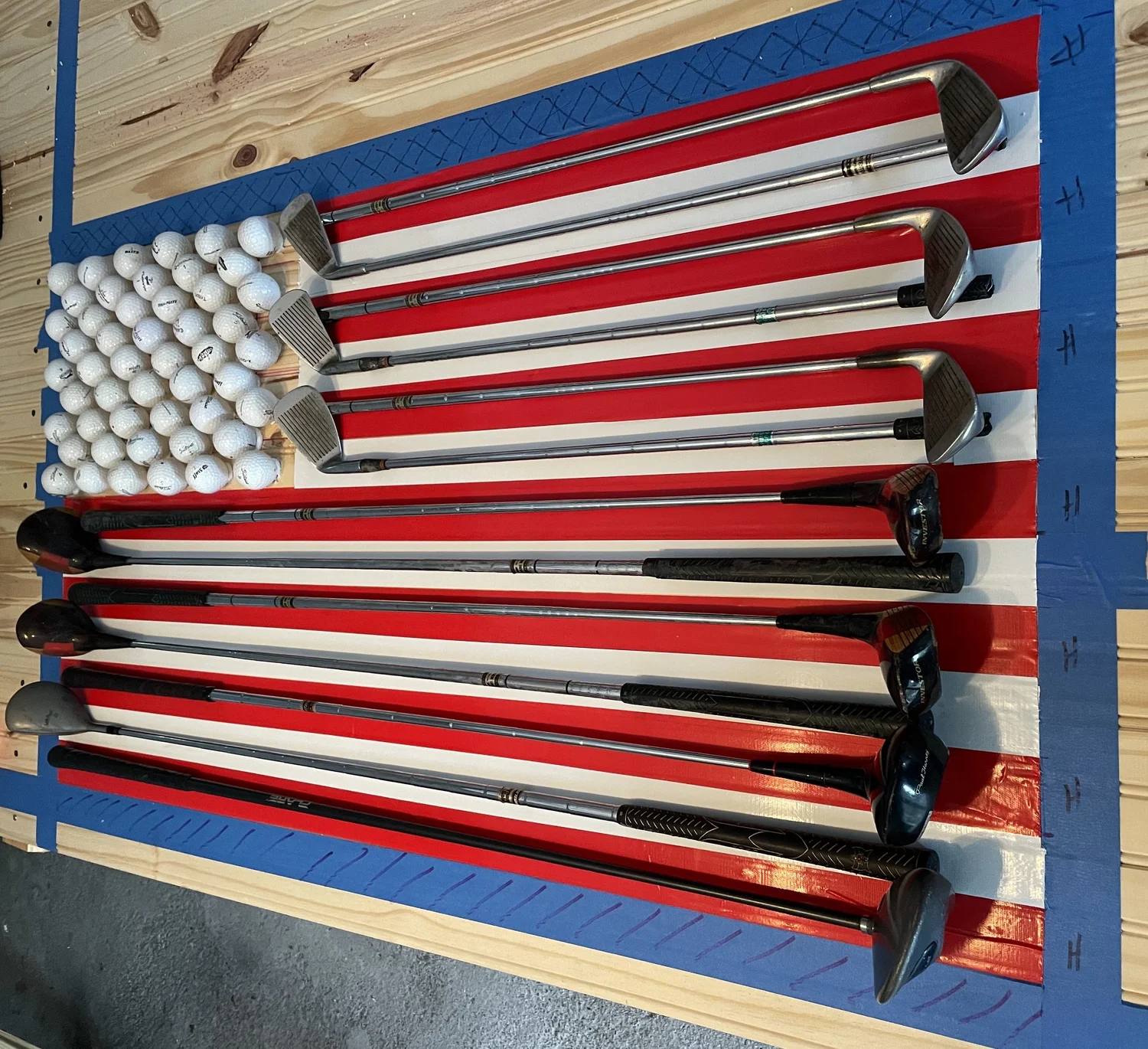 Selecting golf clubs that will become the stripes of the flag