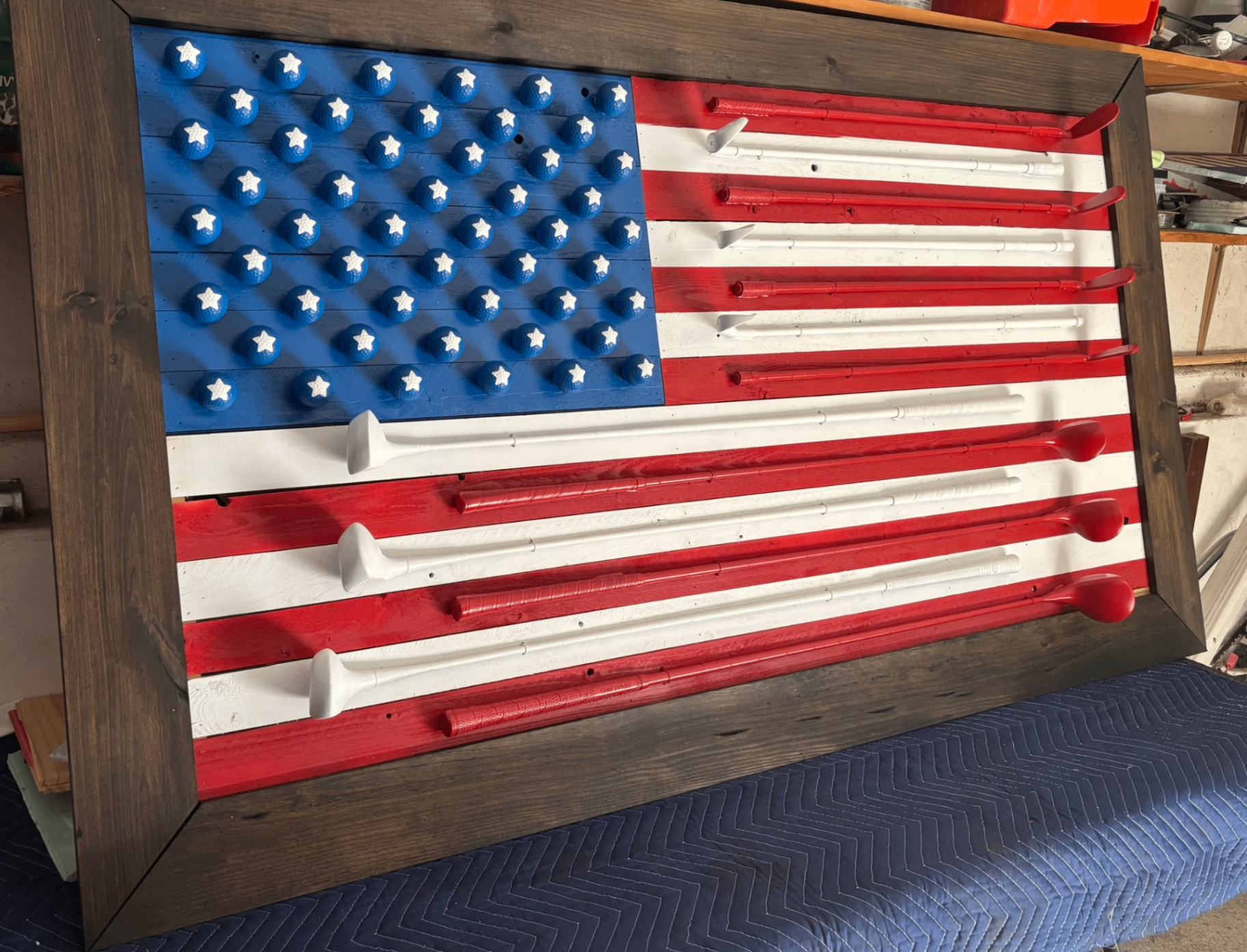 The For Golf & Country flag, made from real golf clubs and balls